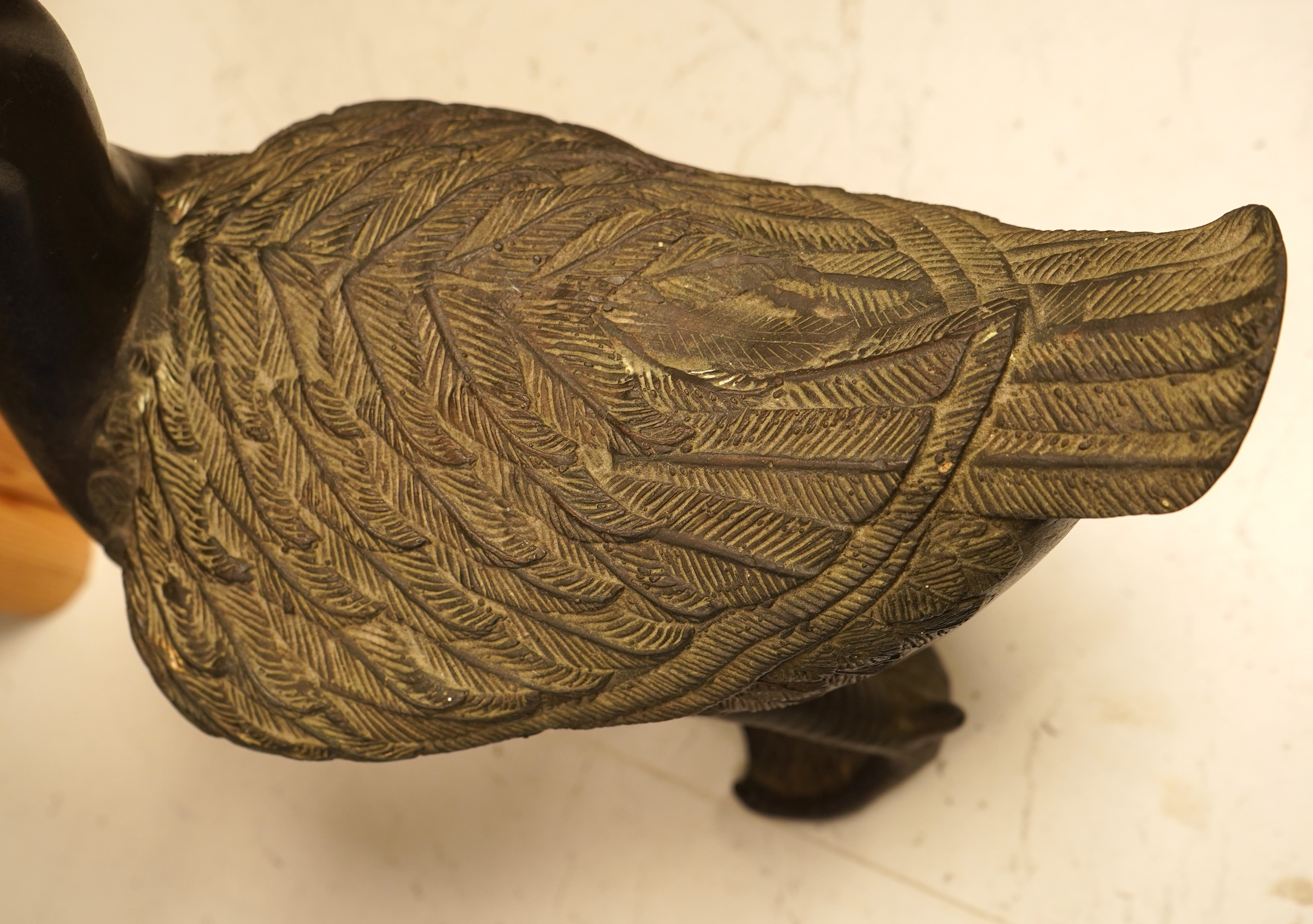 A bronze study of a duck, 30cm high
